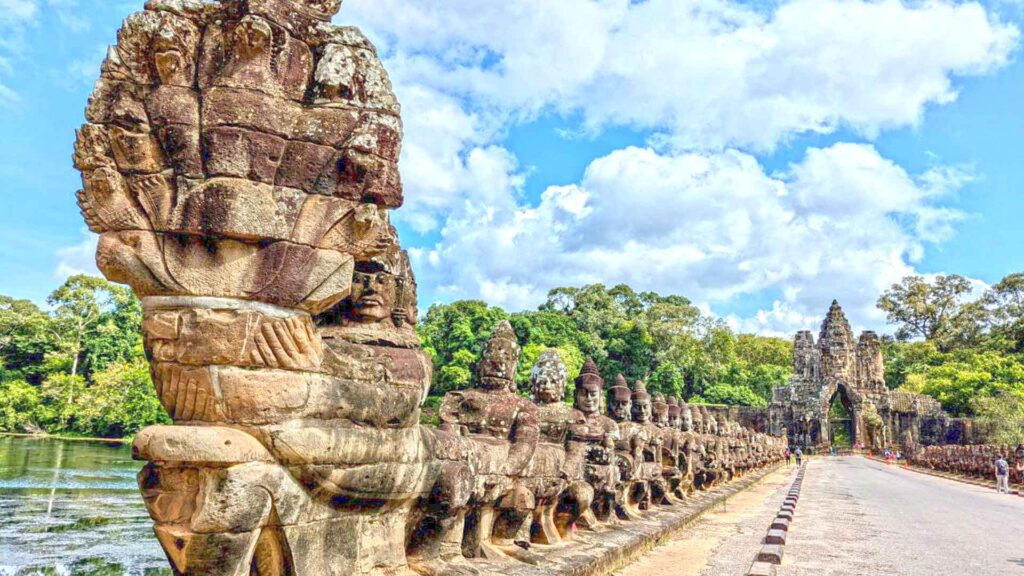 The row of status of gods at the gate of Angkor Thom compound.