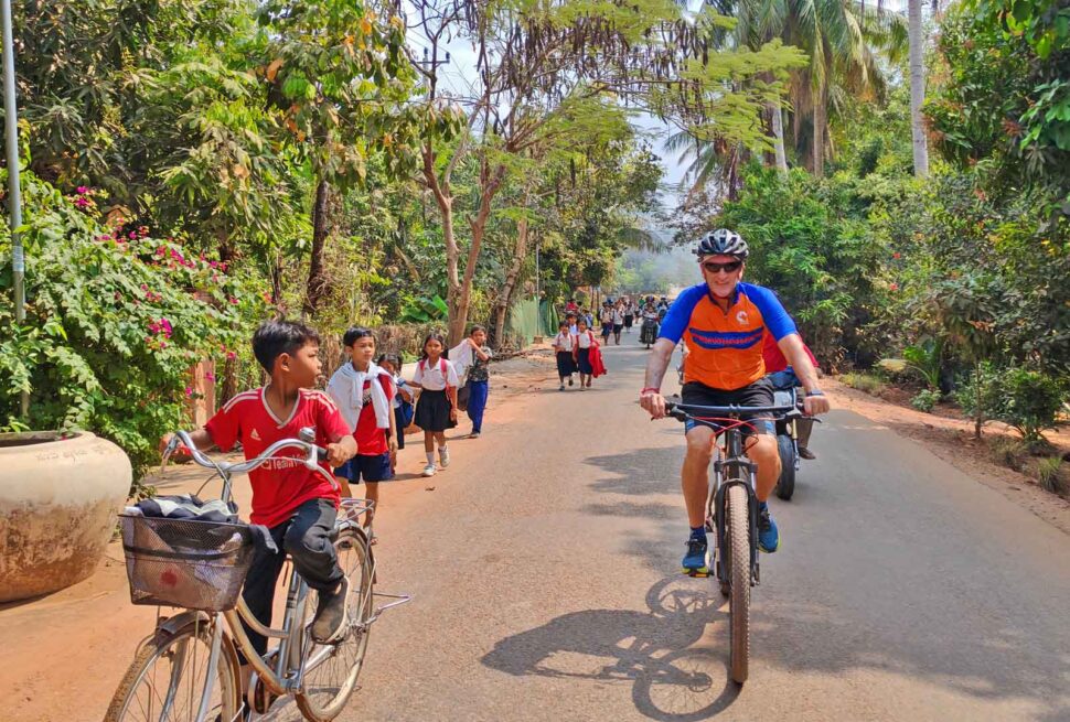 Biking tour through the village and interact with local people, cycle north of Cambodia Trail